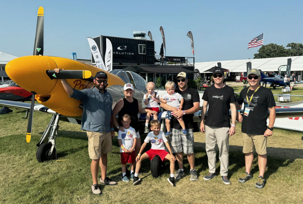 The enthusiastic Schroeder family with their aspiring pilot son Mason, "the real Maverick" TOPGUN pilot Kris, SW-51 MUSTANG driver Ross and CEO Christian